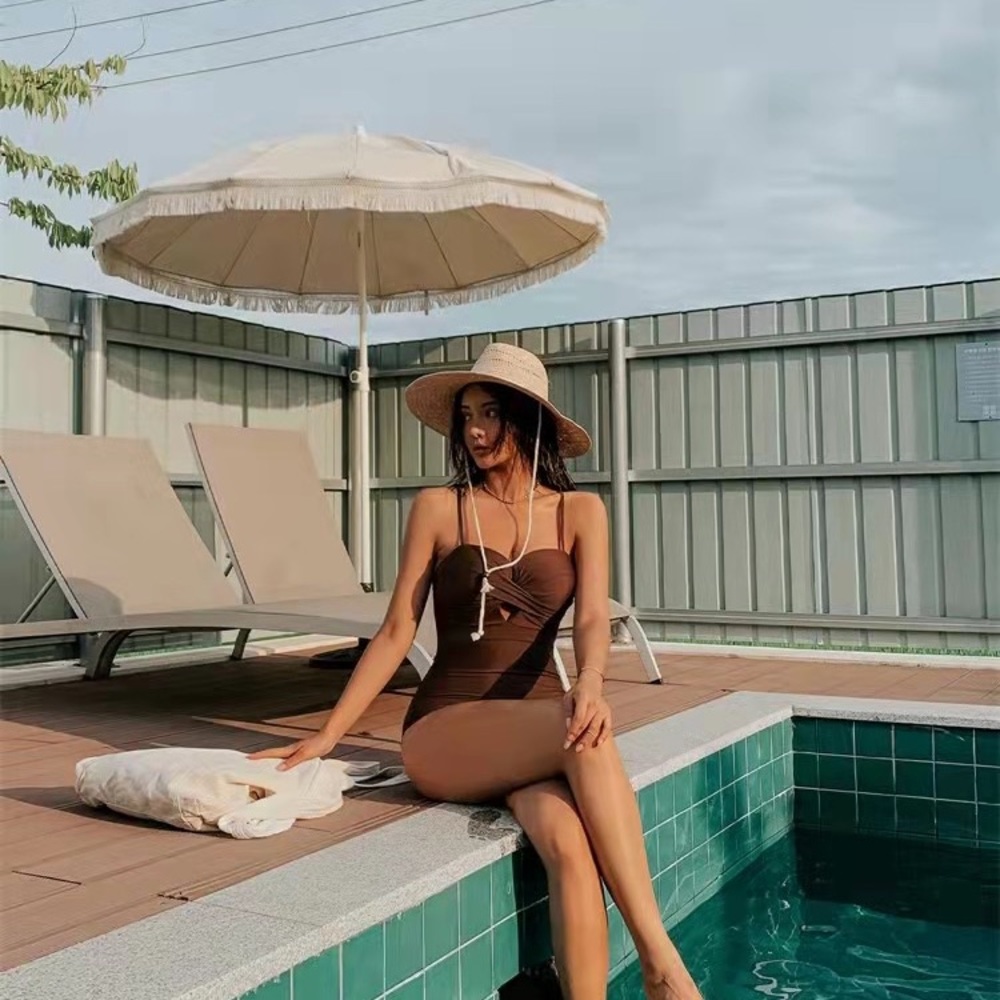 One piece swimsuit in green or brown- fits very small!